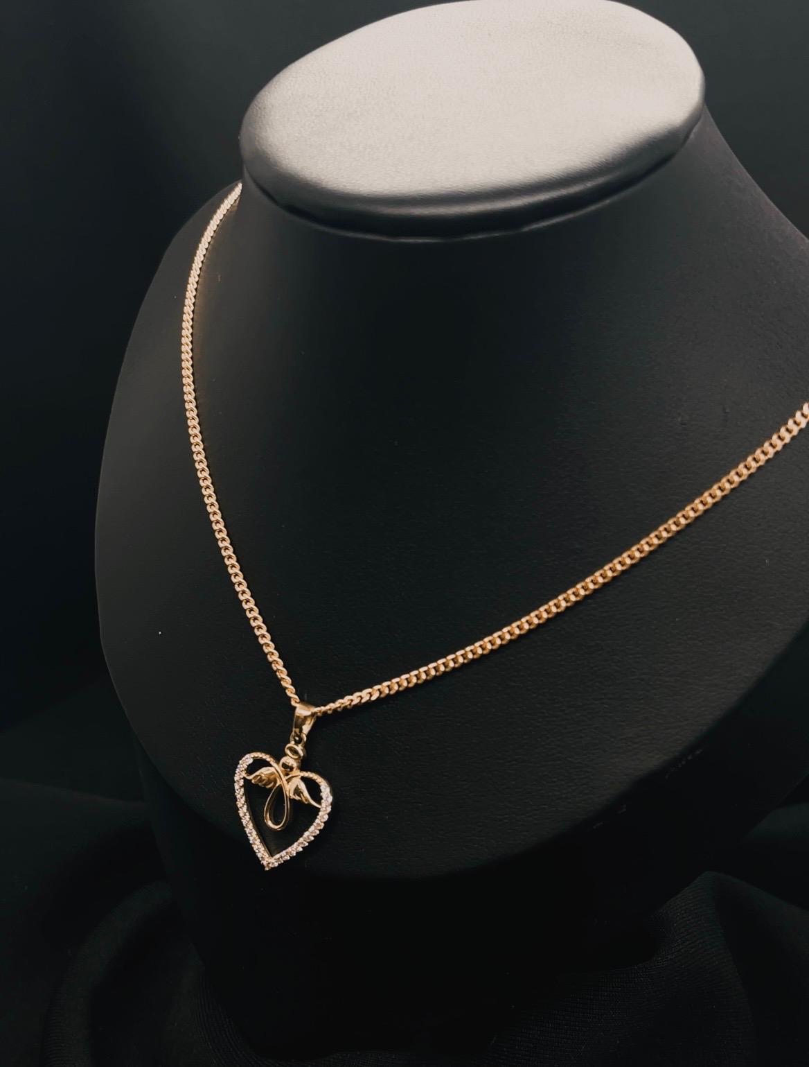 10K Yellow Gold Heart And Angle Pendent With Cz