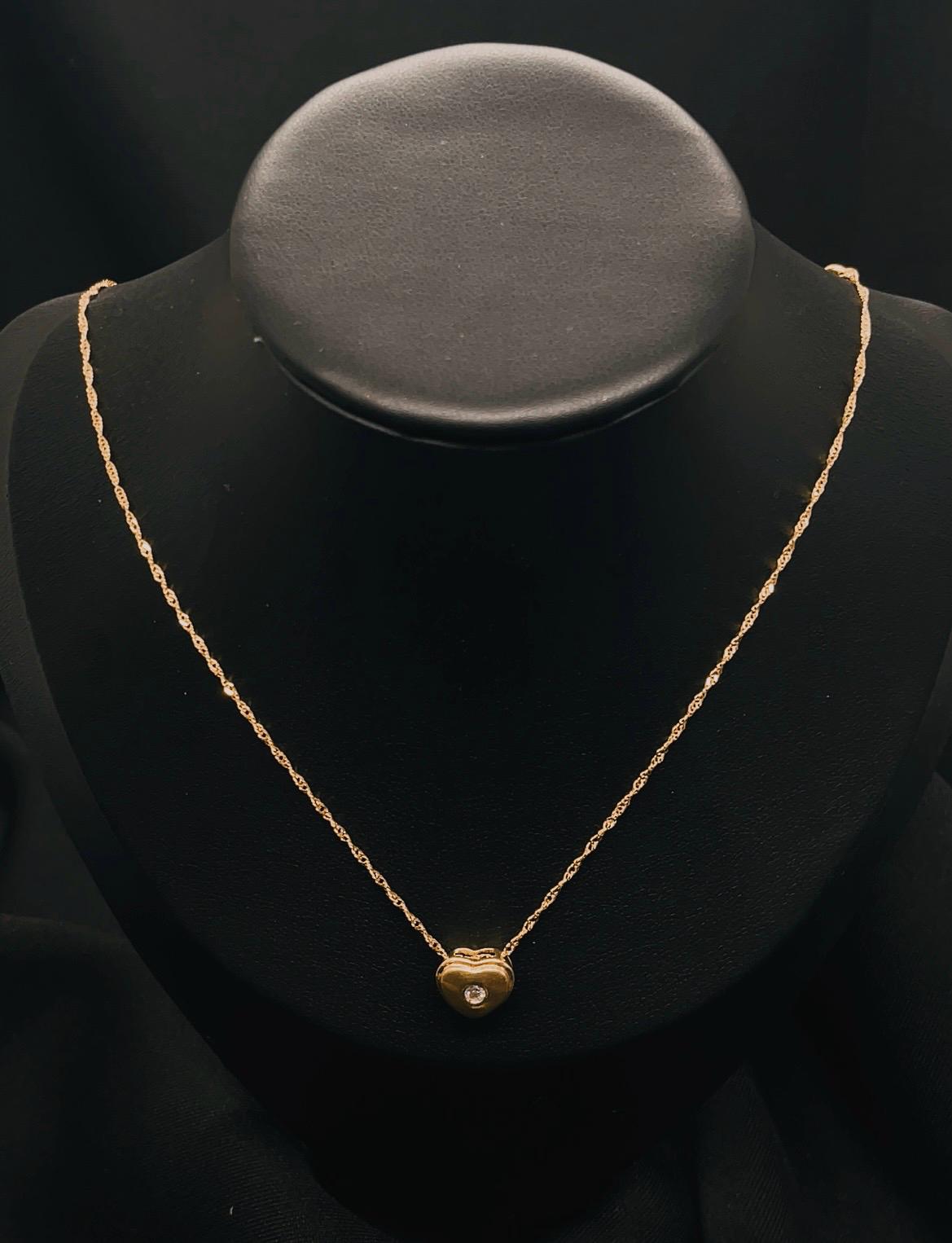 18K Heart Pendent With Natural Diamond